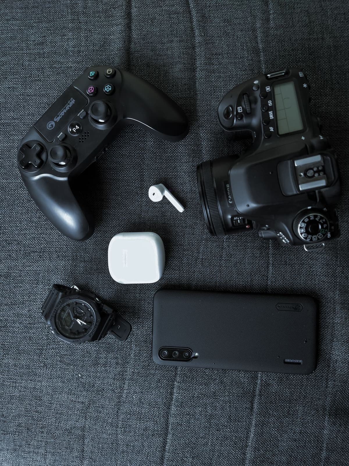 A camera, phone, game controller and other everyday items for sale